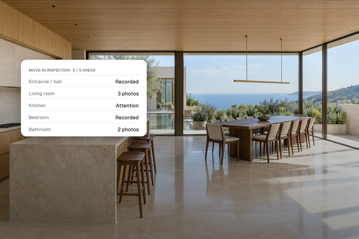 A kitchen in a rental property with a checklist card showing rooms marked as recorded